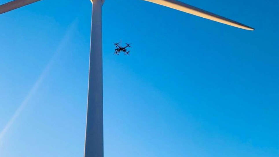 drone next to turbine