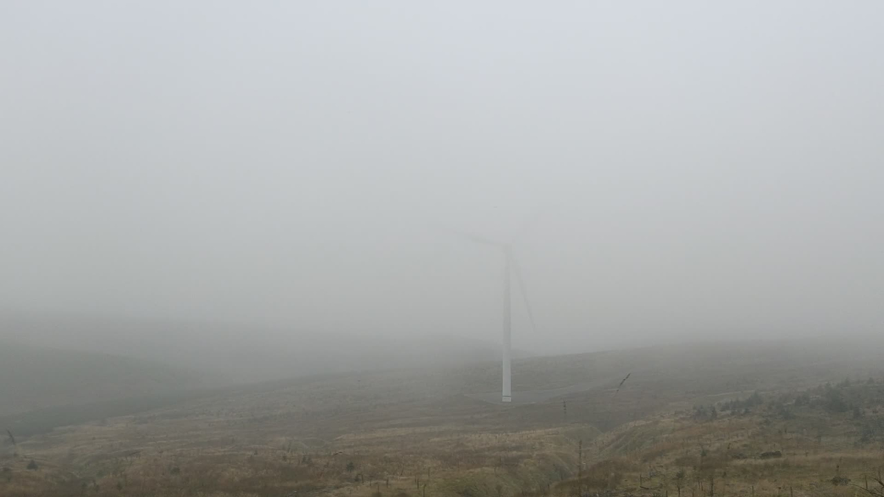 Wind Turbine in mist