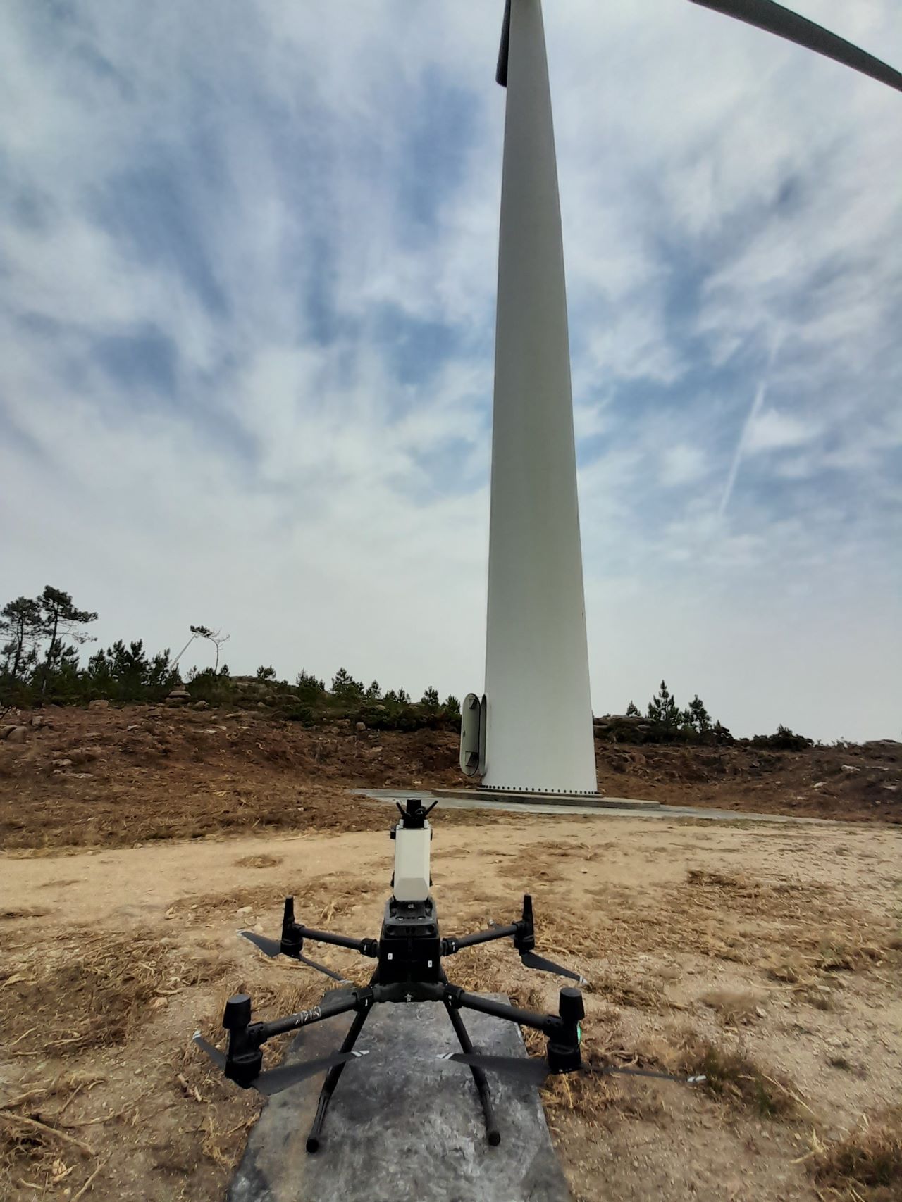 This is a photo of our Dhalion system on the ground in front of a wind turbine.