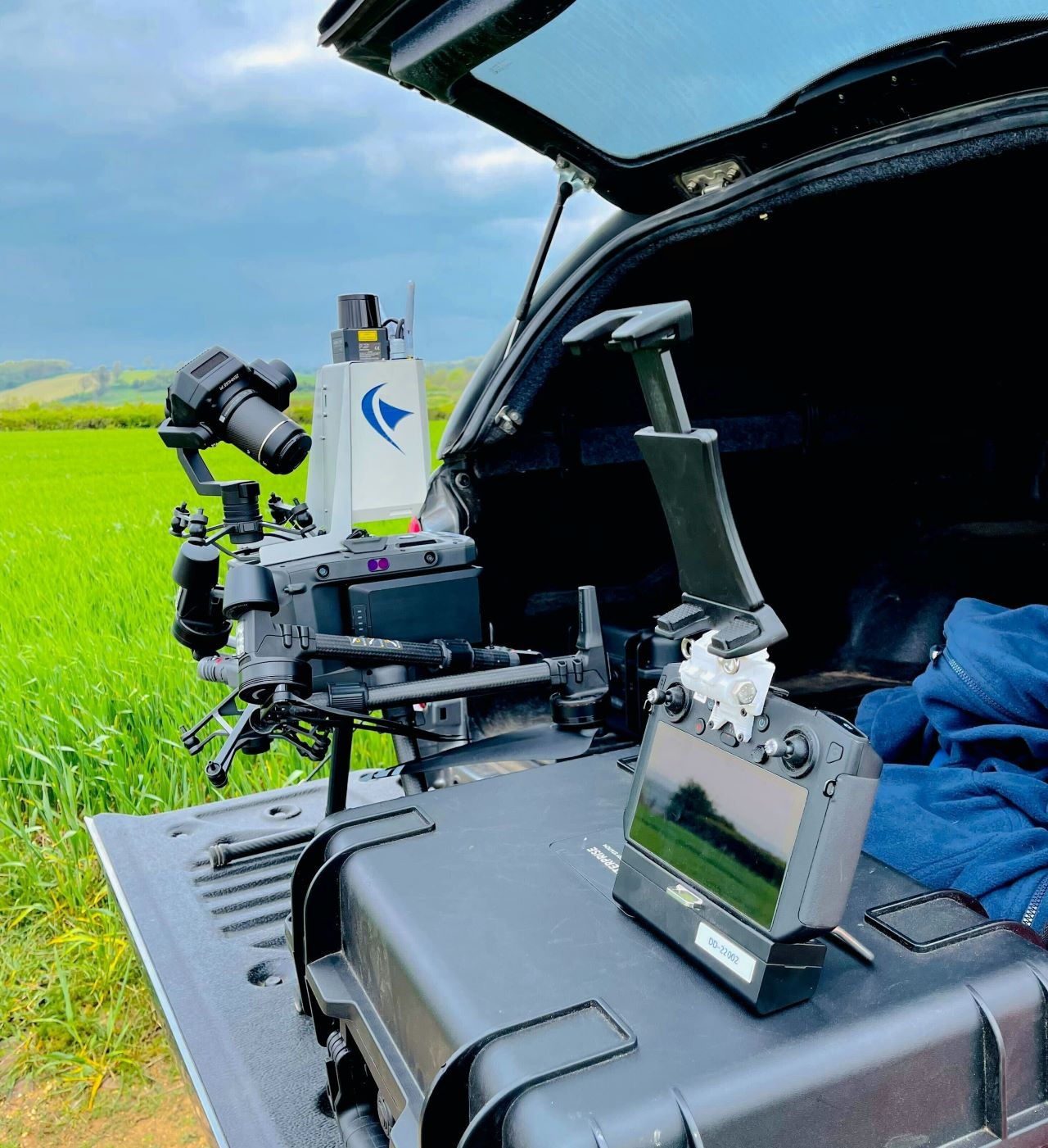 This is an image of our inspection equipment including our drone in the open boot of a car.