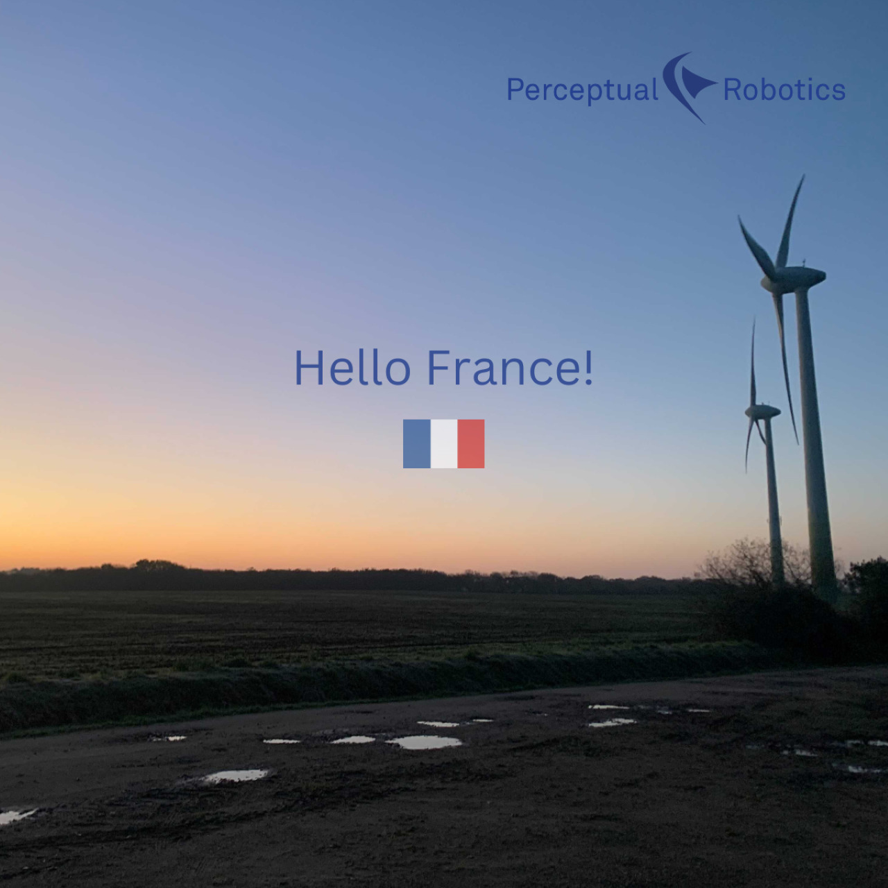 This is an image of a wind turbine with a French flag in the middle of the image with the text 'Hello France!' above it.