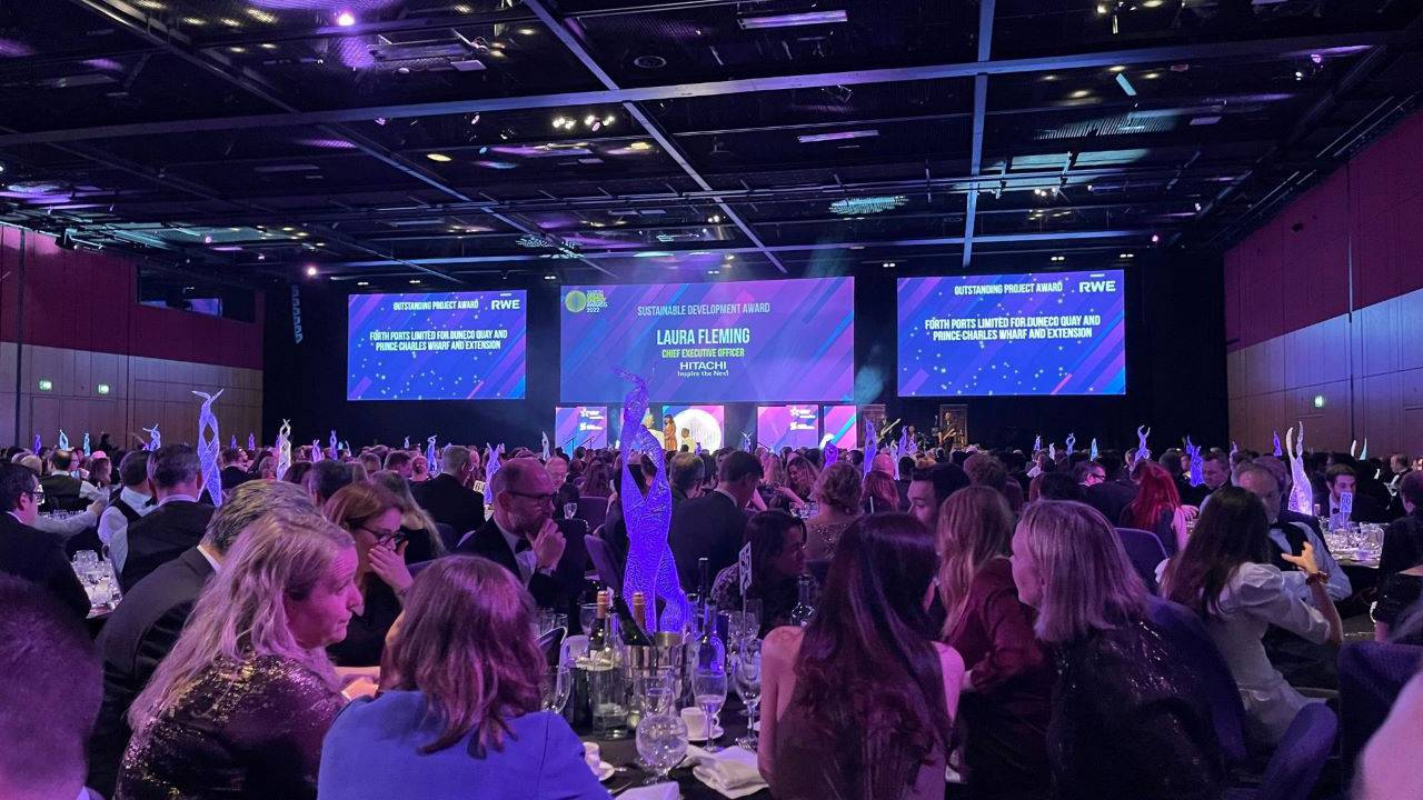 This is an image of the awards ceremony with people sitting at tables.