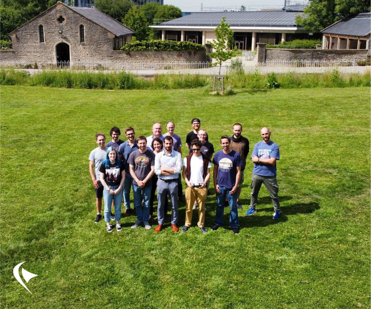 This a photo of the team standing outside together.