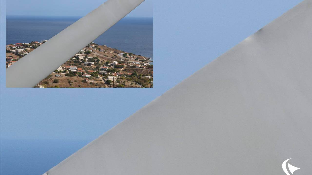This is an image of a wind turbine blade. There is another mage in the corner to show more of the same blade.