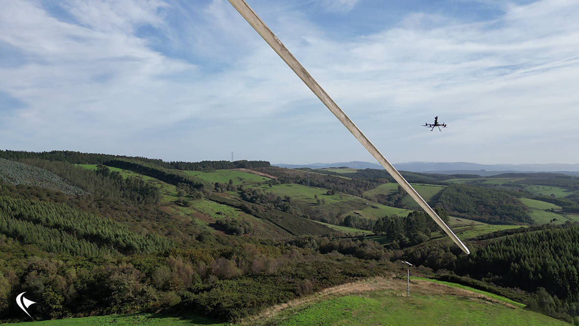 This is an image of our drone inspecting a wind turbine blade.