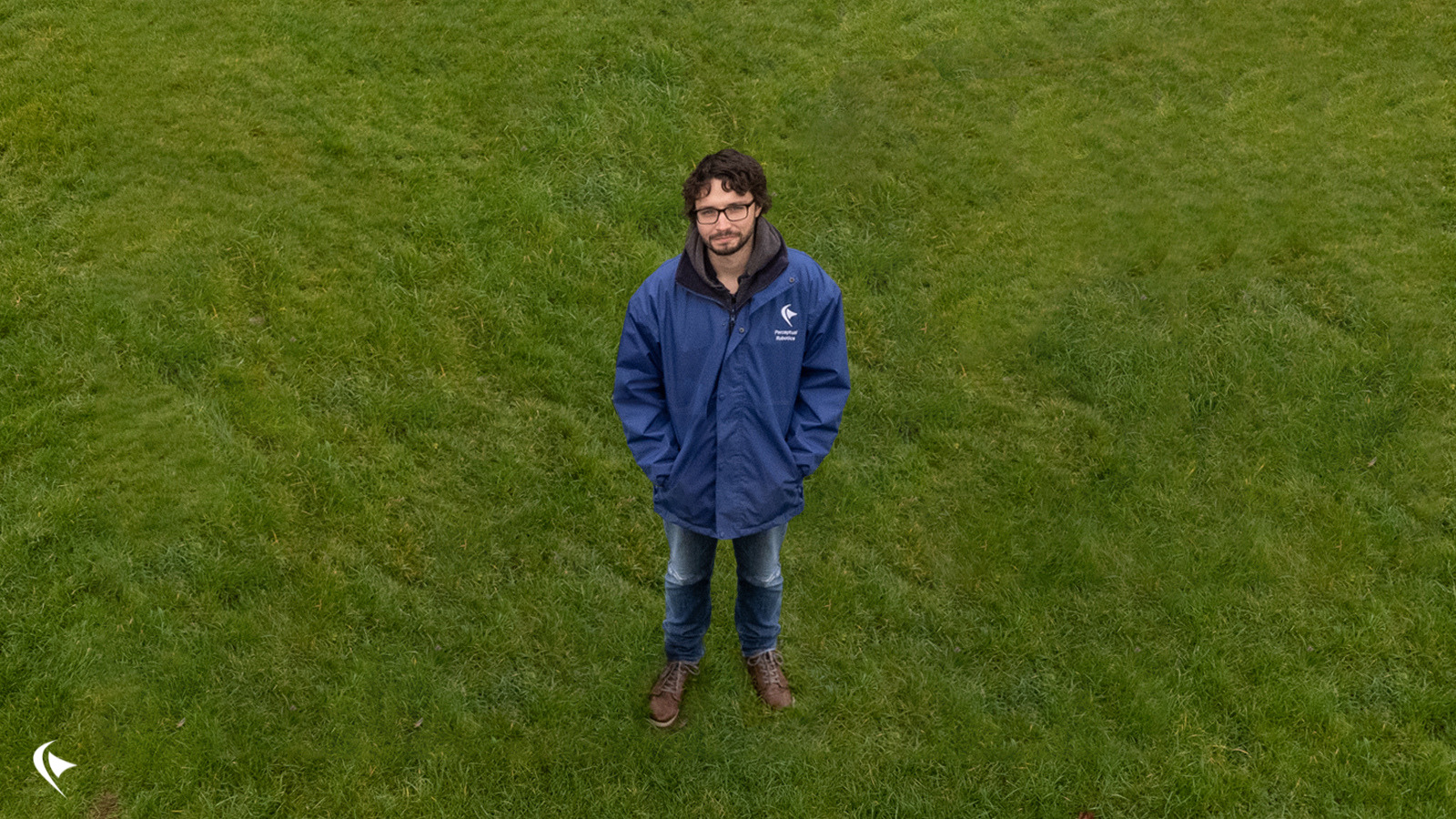 This is an image taken by a drone of Rob outside.